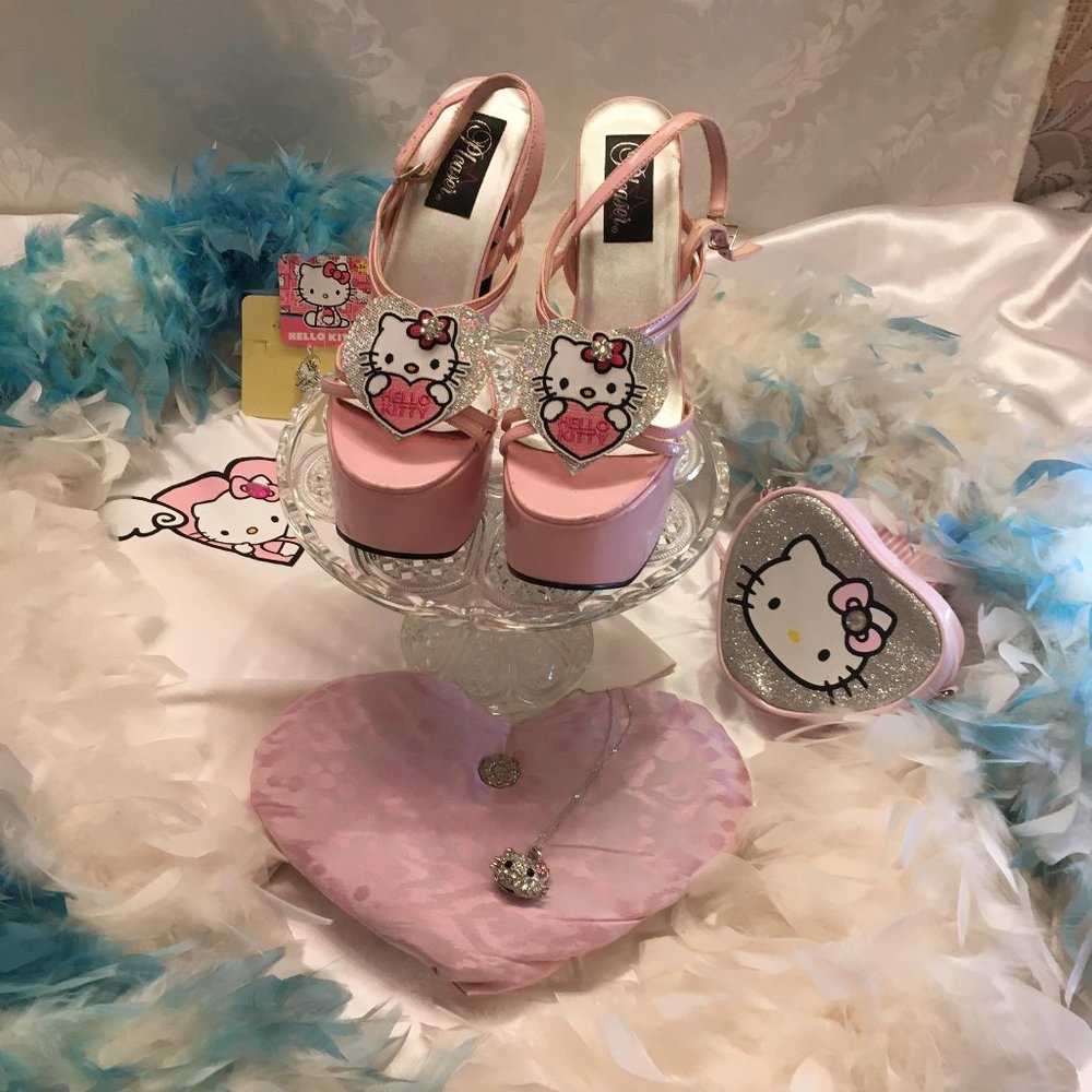 ADORABLE cotton candy pink dream platforms with hello kitty and crystal details!
